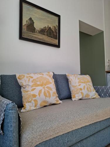 Ruang duduk di Bright and charming apartment from 1878 with view to the new National Museum in Oslo