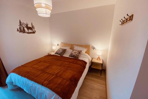 Ένα ή περισσότερα κρεβάτια σε δωμάτιο στο Apartment for 4 to 6 people with terrace
