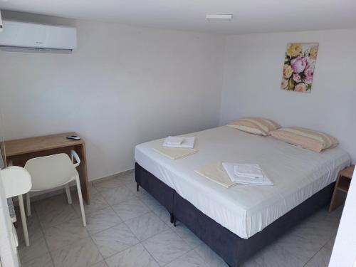 Postel nebo postele na pokoji v ubytování Villa Adriatic Rooms