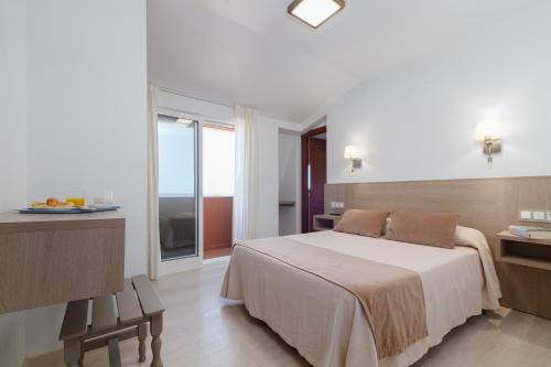 Letto o letti in una camera di Hotel Gaivota