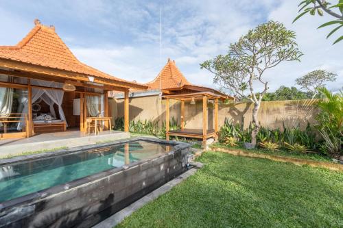 an image of a villa with a swimming pool at The Patra Villa Sebatu in Tampaksiring