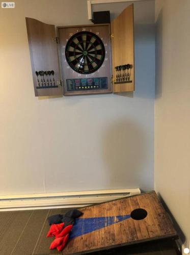 a room with a clock on the wall at Charming, Restful Getaway in Bushkill