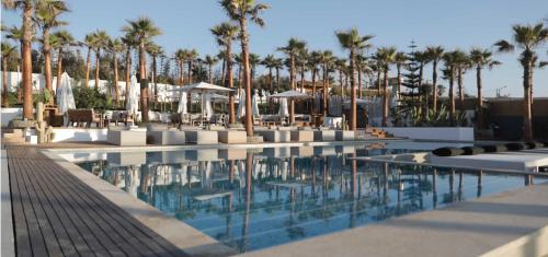 Πισίνα στο ή κοντά στο Appartement avec piscine et accès à la plage