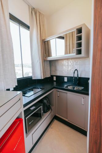 Una cocina o zona de cocina en Chalés Rota dos Lagos