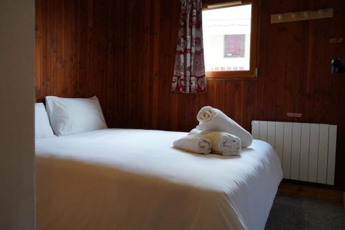 Postel nebo postele na pokoji v ubytování Appartement Ski au pied - Courchevel La Tania