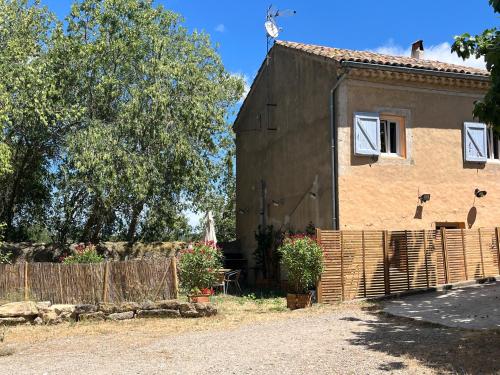 a house with a fence in front of it at SCI Domaine Saint Martin le grand in Béziers