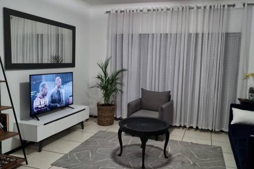TV a/nebo společenská místnost v ubytování LemoNCo Greenstone