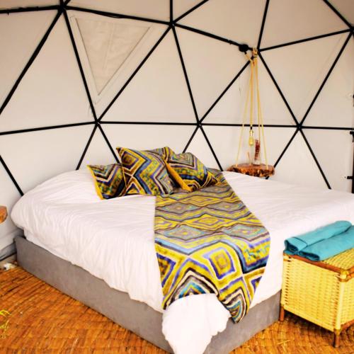 Voodi või voodid majutusasutuse Glamping exclusivo de lujo en la montaña toas