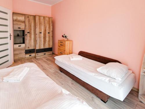 Posteľ alebo postele v izbe v ubytovaní Baltic Edge Apartments
