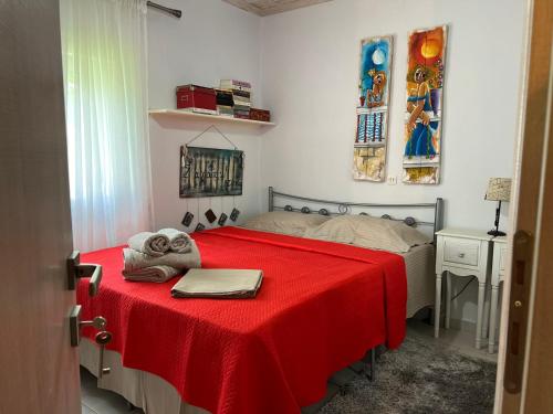 En eller flere senge i et værelse på Sias Cozy House