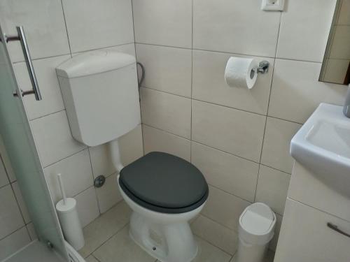 Koupelna v ubytování Apartments Nevija