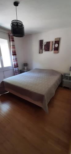 Llit o llits en una habitació de Villa Bellevue