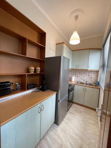 Η κουζίνα ή μικρή κουζίνα στο Maria's central apartment