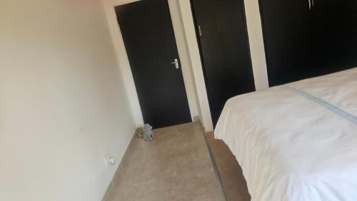Kwa Mimi Guesthouseにあるベッド