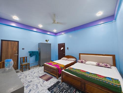 Katil atau katil-katil dalam bilik di RG Homestay
