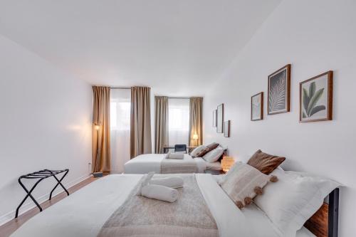Postel nebo postele na pokoji v ubytování Condo 201 - District Branché St-Roch