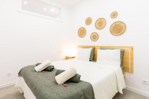 Ένα ή περισσότερα κρεβάτια σε δωμάτιο στο Casa na Areia