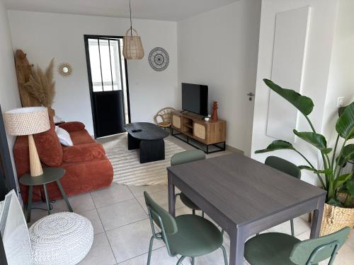 Posezení v ubytování Confortable appartement avec terrasses entre Paris et Disney