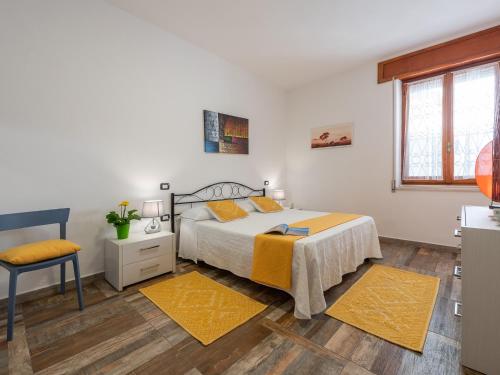 Un pat sau paturi într-o cameră la Casa con ampio cortile