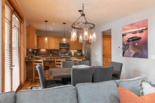 a living room with a couch and a table at Fairway Drive 13113 by East West Hospitality in Truckee