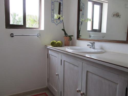 a bathroom with a sink and a mirror at descanso en espacio natural con vistasTharada in El Roque