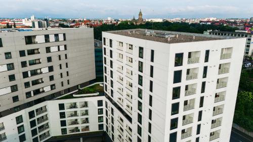 an aerial view of two white buildings in a city at EVRA APARTMENTS Royal 2 in Timişoara