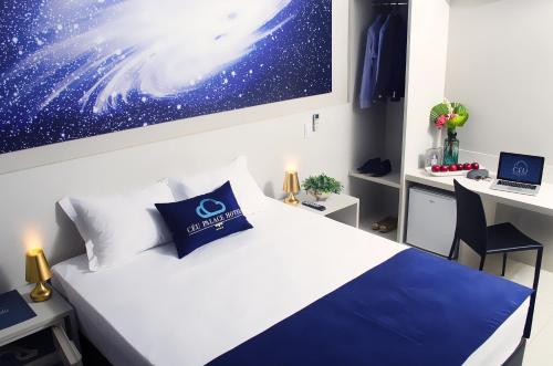 Katil atau katil-katil dalam bilik di CEU PALMAS Hotel