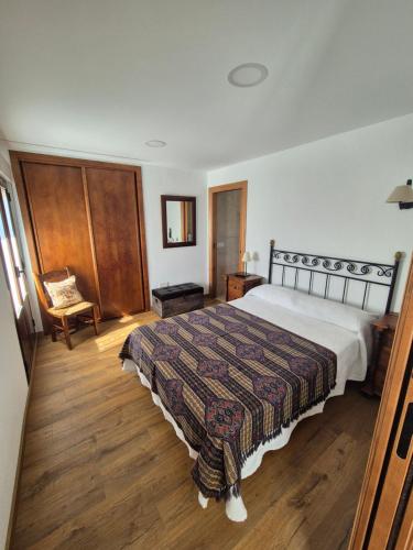 Ένα ή περισσότερα κρεβάτια σε δωμάτιο στο Apartamentos Rio Almar