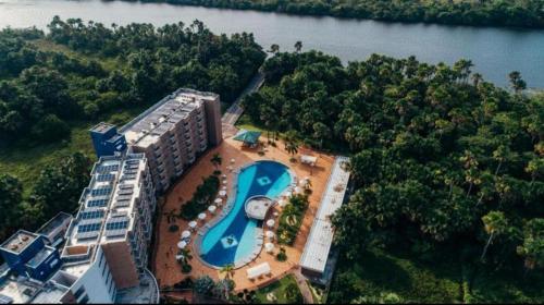 an aerial view of a resort with a swimming pool at Gran Lençóis Flat Barreirinhas APT 510 in Barreirinhas