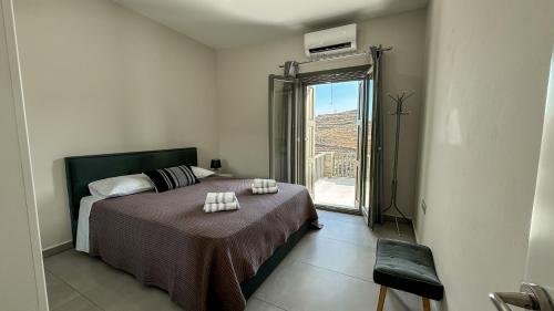 Giường trong phòng chung tại La vie en Abela