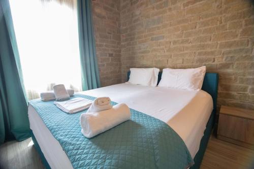 Posteľ alebo postele v izbe v ubytovaní Agora Boutique Apartments Ioannina