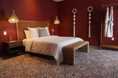 a bedroom with a large bed in a room at Casa Martina Guest House in Pátzcuaro