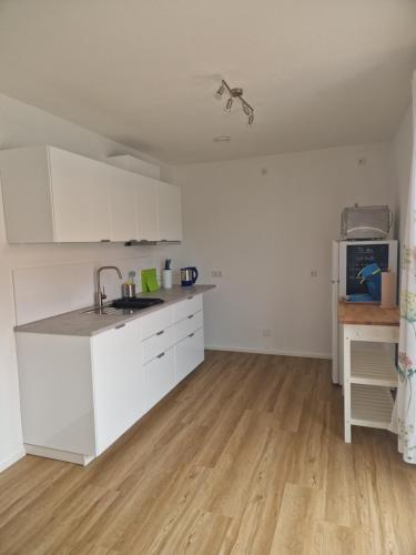 Η κουζίνα ή μικρή κουζίνα στο Apartements WaWohnen