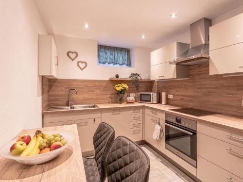 Η κουζίνα ή μικρή κουζίνα στο Geräumige Wohnung mit Sauna