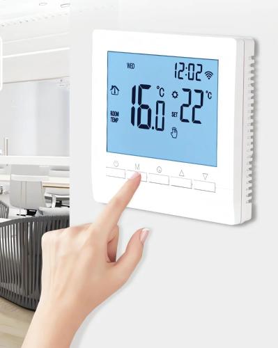a hand pointing at a digital clock on a wall at RG Boutique Hotel in Yerevan