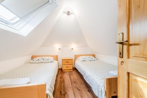 Posteľ alebo postele v izbe v ubytovaní Apartmaji Mouse