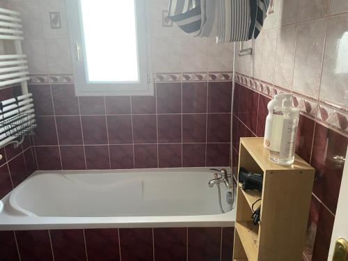 Koupelna v ubytování Grand logement 5 min de Paris