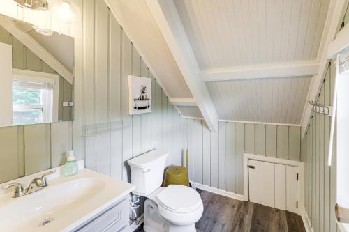a bathroom with a sink toilet and a mirror at 1 Mi to Beech Mtn Ski Resort Home with Large Yard in Beech Mountain