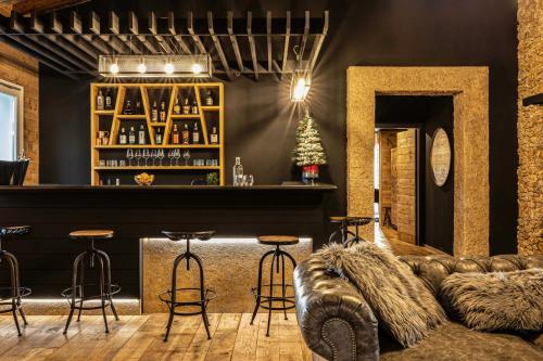 Lounge nebo bar v ubytování BAITA MAORE luxury rooms & Spa