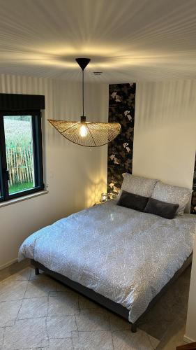 Ένα ή περισσότερα κρεβάτια σε δωμάτιο στο Villa Gwin Zegal