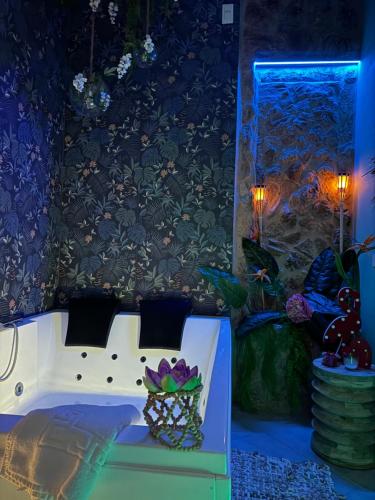 a room with a bed with a vase on it at Mary Gery's Rooms in Castellammare del Golfo