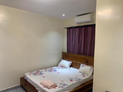 Postel nebo postele na pokoji v ubytování Appartement dakar almadis