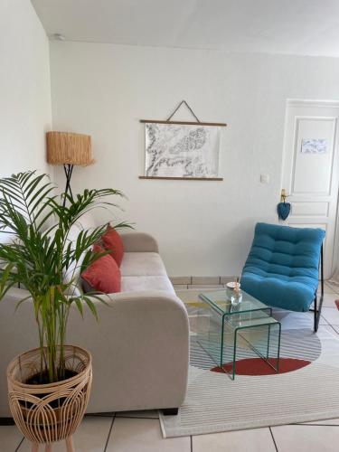 Coin salon dans l'établissement NEW La ferme fleurie Gîte Ty Rose