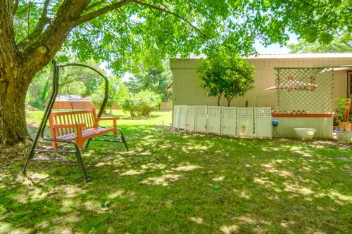 a swing in a yard with a tree at Andover Home Near State Park with Patio and Yard! in Hartstown
