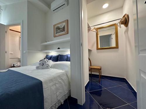 Katil atau katil-katil dalam bilik di Pompei Blu Sant'Auri Apartment