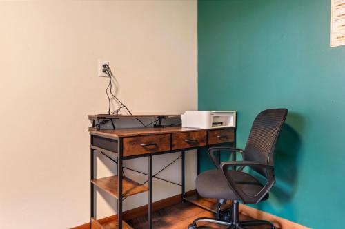 an office with a desk and a chair at Large Home with lake views and space to entertain friends in Cross Lake