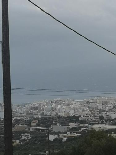 a view of a city from a power line at Sunset hellen in Katsíkia