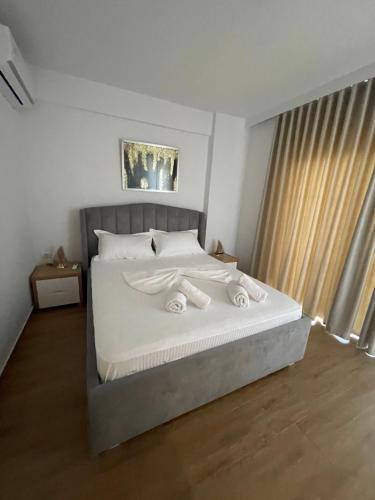 Postel nebo postele na pokoji v ubytování ODORE DI MARE APARTMENTs