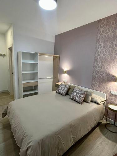 Ένα ή περισσότερα κρεβάτια σε δωμάτιο στο Piso céntrico helicóptero