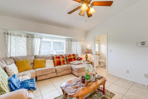 a living room with a couch and a ceiling fan at Port Charlotte Home about 3 Mi to Beach and Harbor! in Port Charlotte